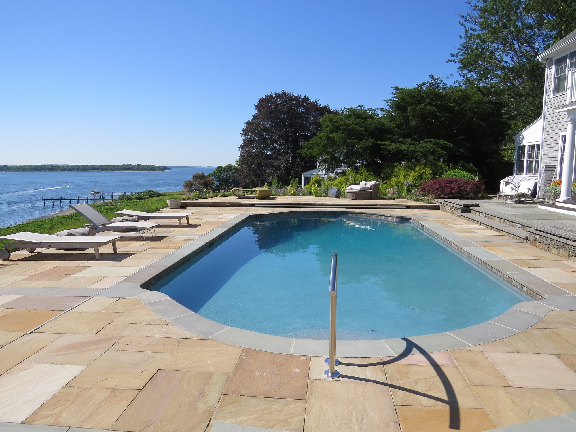 Waterfront property with pool and terrace