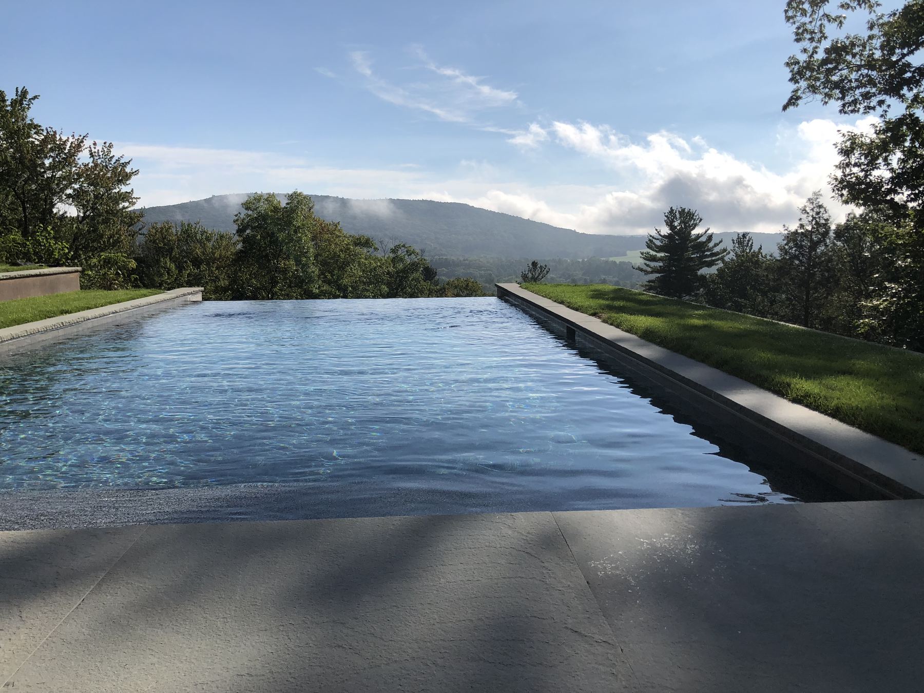 Infinity pool overlooking the Berkshire hills at dawn